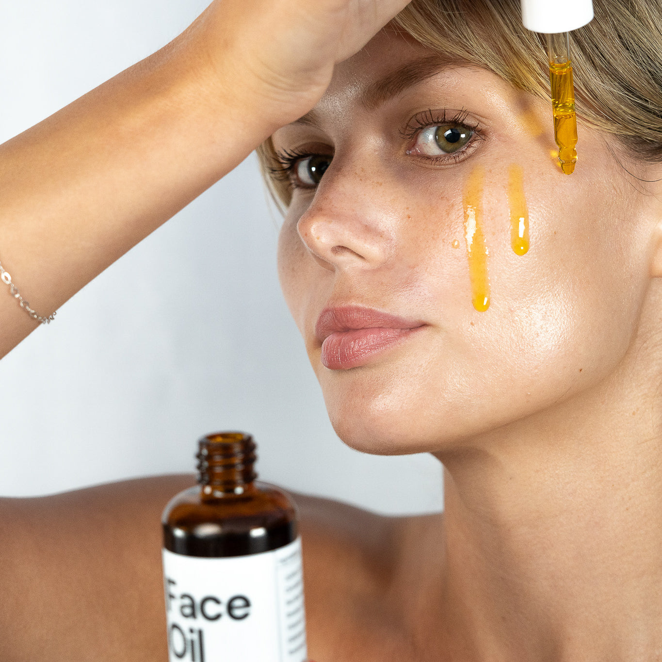 Face Oil – nothing else.